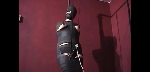  Mummified whore gets nipple tortured and vibrator in her pussy.WMV